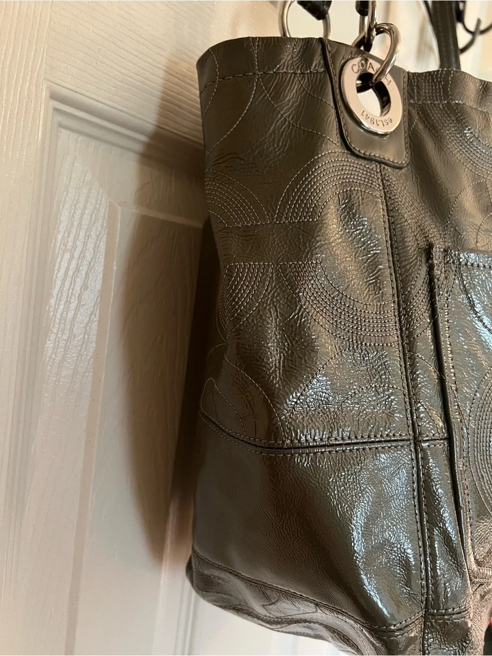 Coach Alex signature stitch patent monogram bag